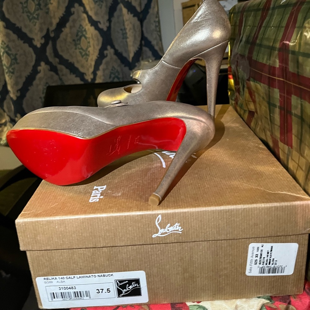 Red bottoms super high heel. originals .